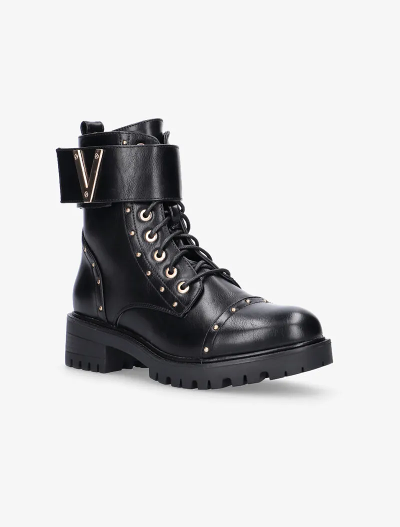 Boots à sangle ornée d'un V doré