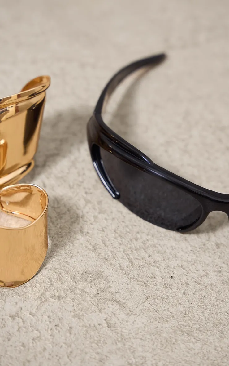 Lunettes de soleil visière noire style sport